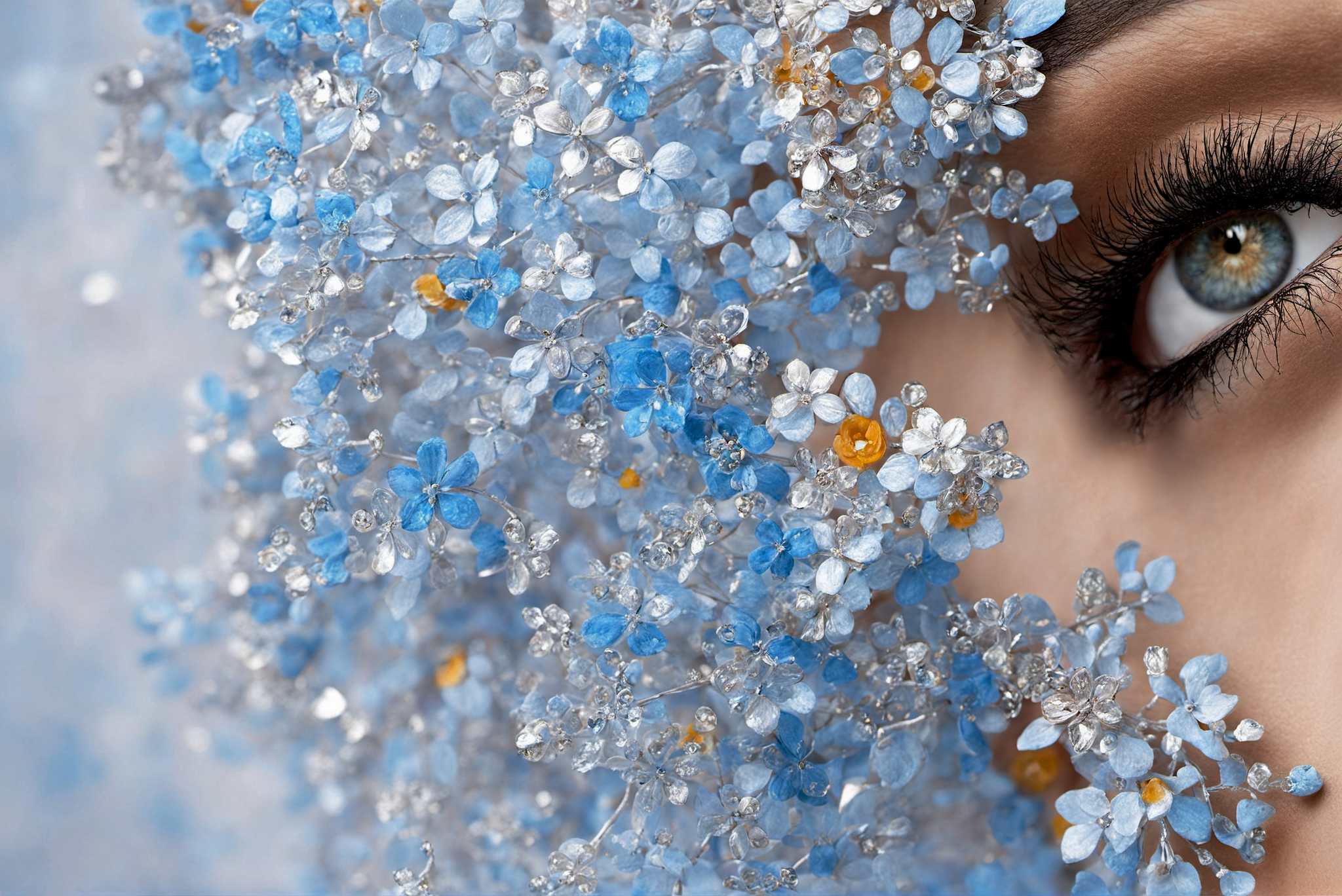 Eyes amidst azure reverie: Crystal flower art with crystal art collection, in a room with chic decor, mural artworks, and stylish accessories. The art can be printed on poster, framed poster, canvas, metal, acrylic or wood, exclusively at WallArtZen. Find this exact print at https://wallartzen.com/waz3