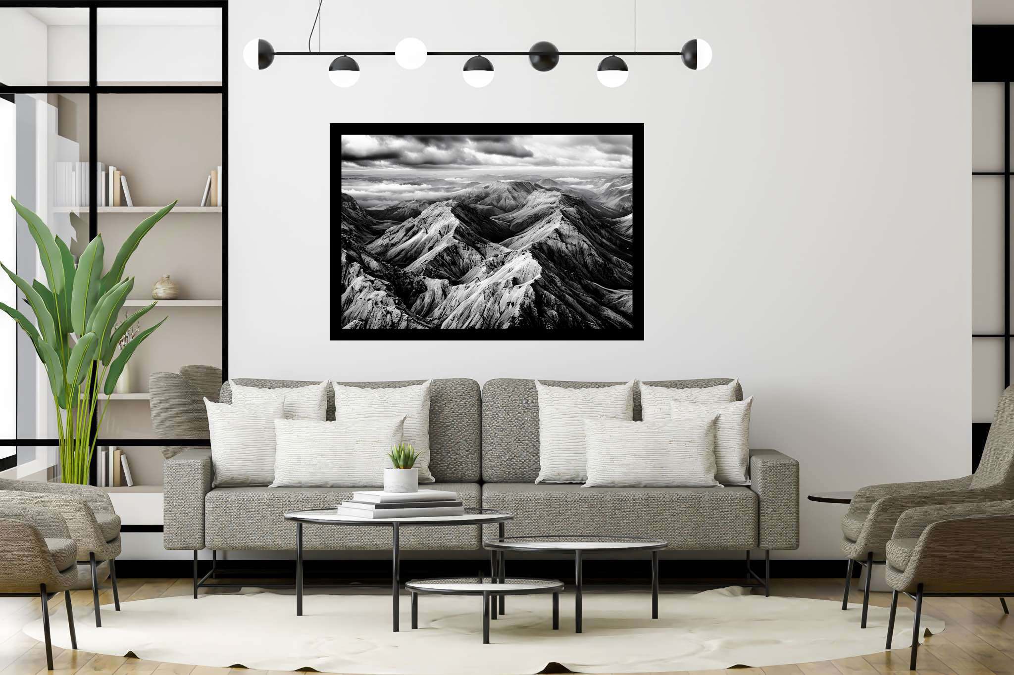 Veiled peaks serenade: Captivating aerial landscape art with stunning aerial imagery, in a room with great design, framed art, and trendy home accents. The art can be printed on poster, framed poster, canvas, metal, acrylic or wood, exclusively at WallArtZen. Find this exact print at https://wallartzen.com/waz125
