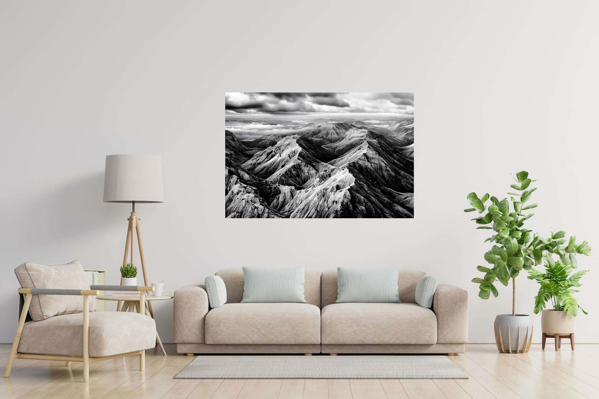 Veiled peaks serenade: Captivating aerial landscape art with stunning aerial nature art, in a room with urban design, wall art, and designer furniture. The art can be printed on poster, framed poster, canvas, metal, acrylic or wood, exclusively at WallArtZen. Find this exact print at https://wallartzen.com/waz125