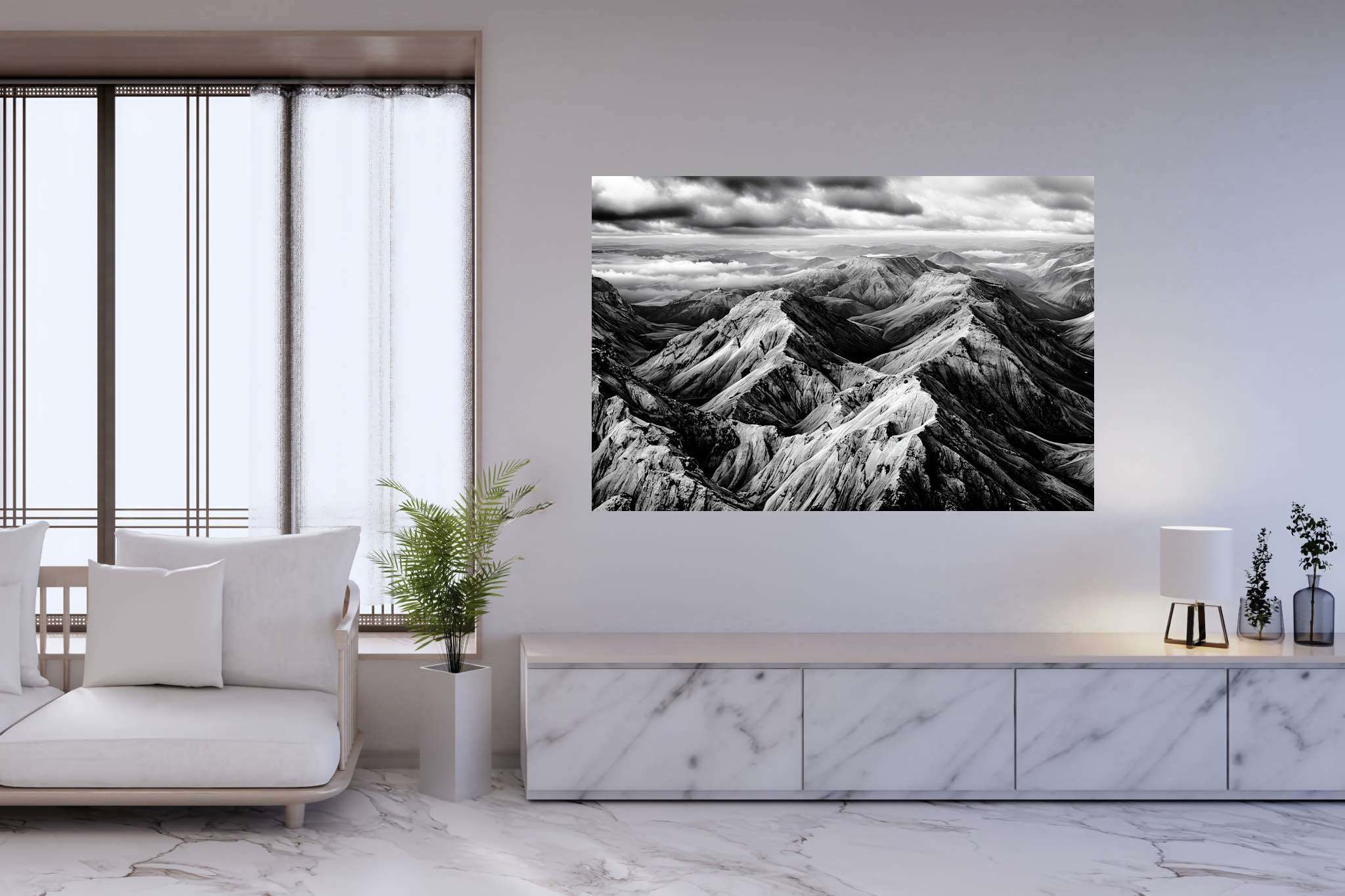 Veiled peaks serenade: Captivating aerial landscape art with breathtaking aerial scenery, in a room with elegant layout, wall hangings, and home styling items. The art can be printed on poster, framed poster, canvas, metal, acrylic or wood, exclusively at WallArtZen. Find this exact print at https://wallartzen.com/waz125